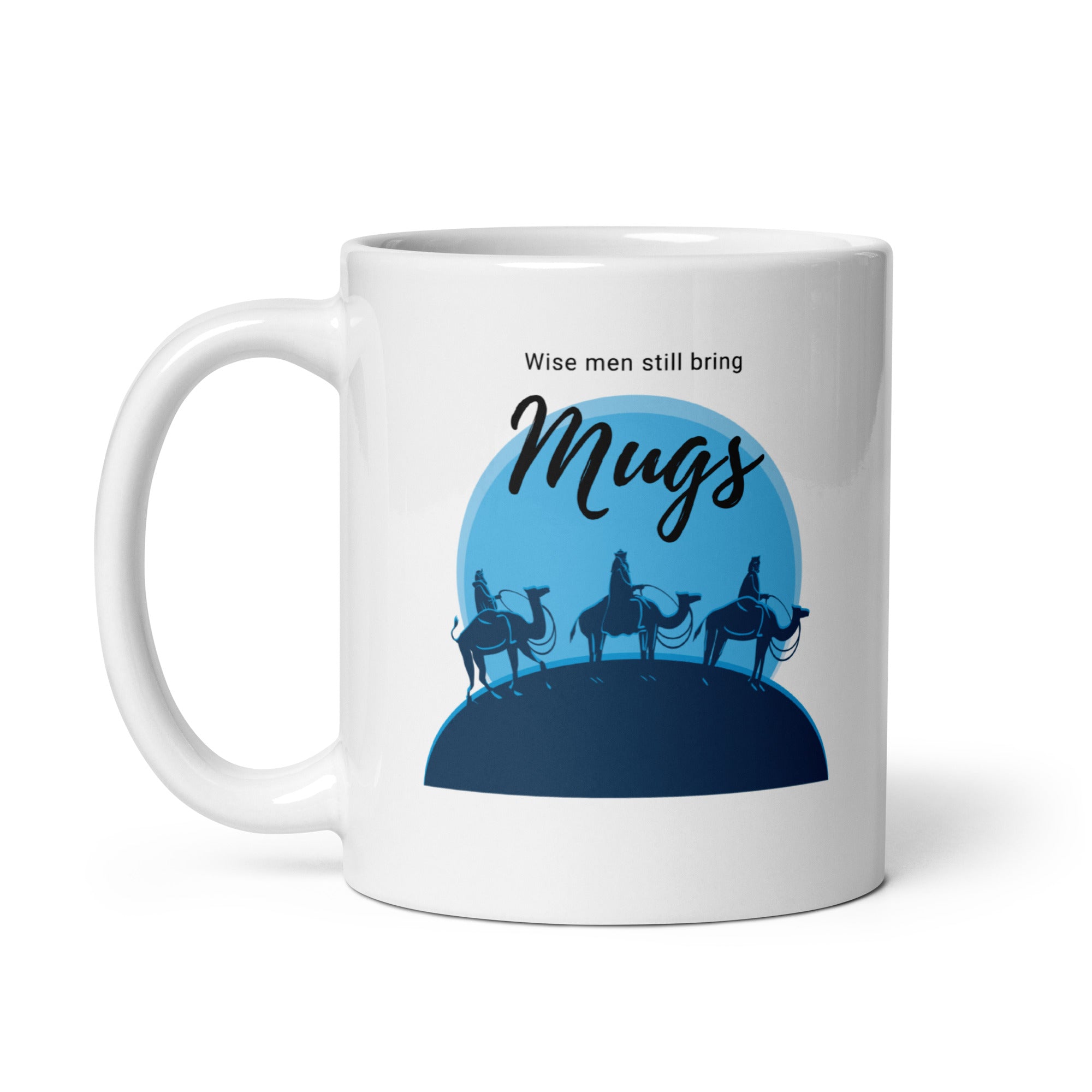 A white coffee mug with a blue silhouette of the three wise men on camels and the funny, faith-based text 'Wise men still bring Mugs'